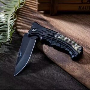 Black and Green Folding Knife